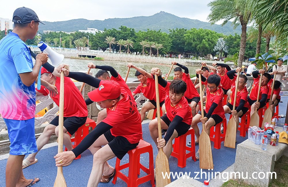 Chinese eat rice dumplings on Dragon Boat Festival to prepare for dragon boat race