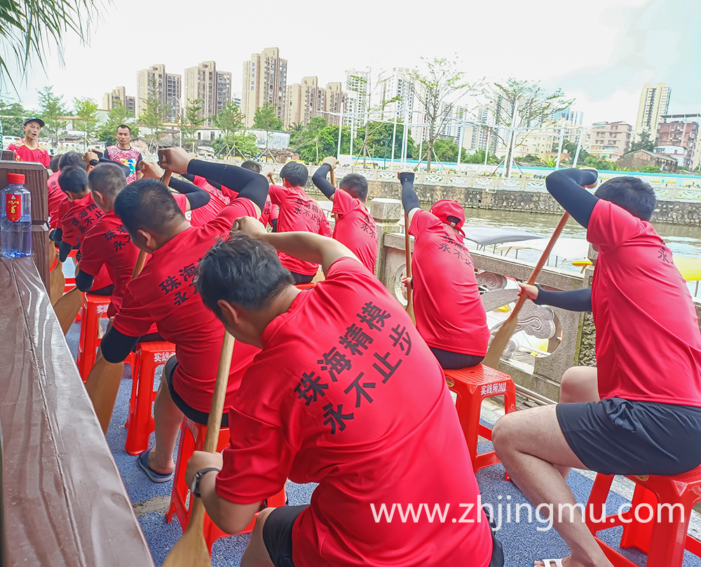 Chinese eat rice dumplings on Dragon Boat Festival to prepare for dragon boat race